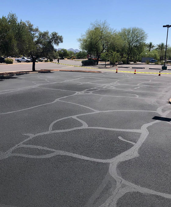 asphalt with crack sealing